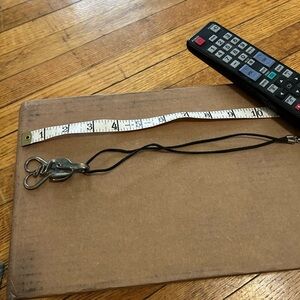 Silver necklace made of a fork. Artist made. Never worn. Needs cleaned.